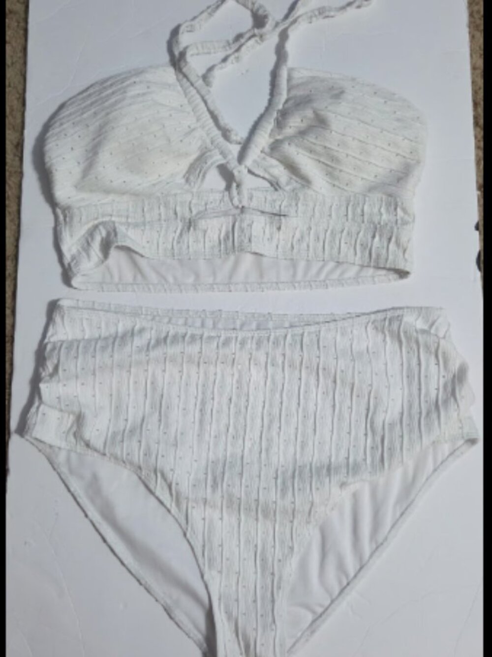 Woman's all white 2 piece bathing suit